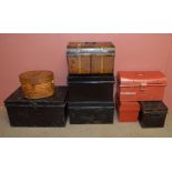 A group of ten early to mid-20th century tin chests and trunks of varied size,