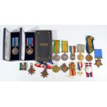 A mixed medal group to include two 1914/15 Stars, two Victory medals and a War medal,