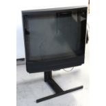 A Bang & Olufsen vintage TV, model 100783 8 4MKII 6, with instructions, manual and remote control.