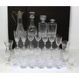 A quantity of crystal and cut glass drinking vessels to include wine glasses, tumblers etc,