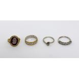Three 18ct gold dress rings to include a yellow and white gold band set with small white stones,