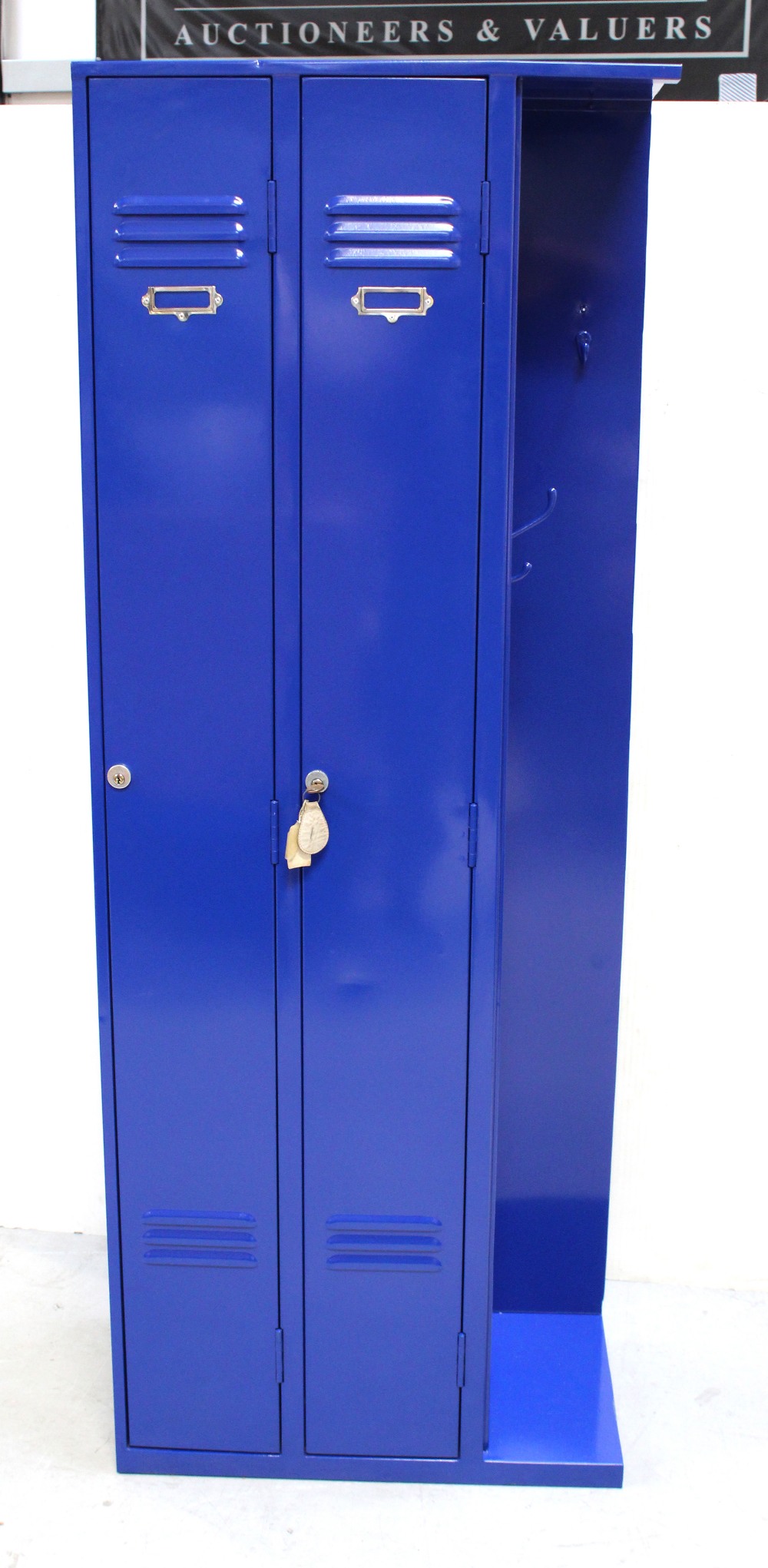 A blue-painted locker unit, with two locking doors and hangers to side, height 178cm, width 66.5cm.