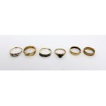 Three 9ct gold ladies' wedding bands, sizes Q, K and L,