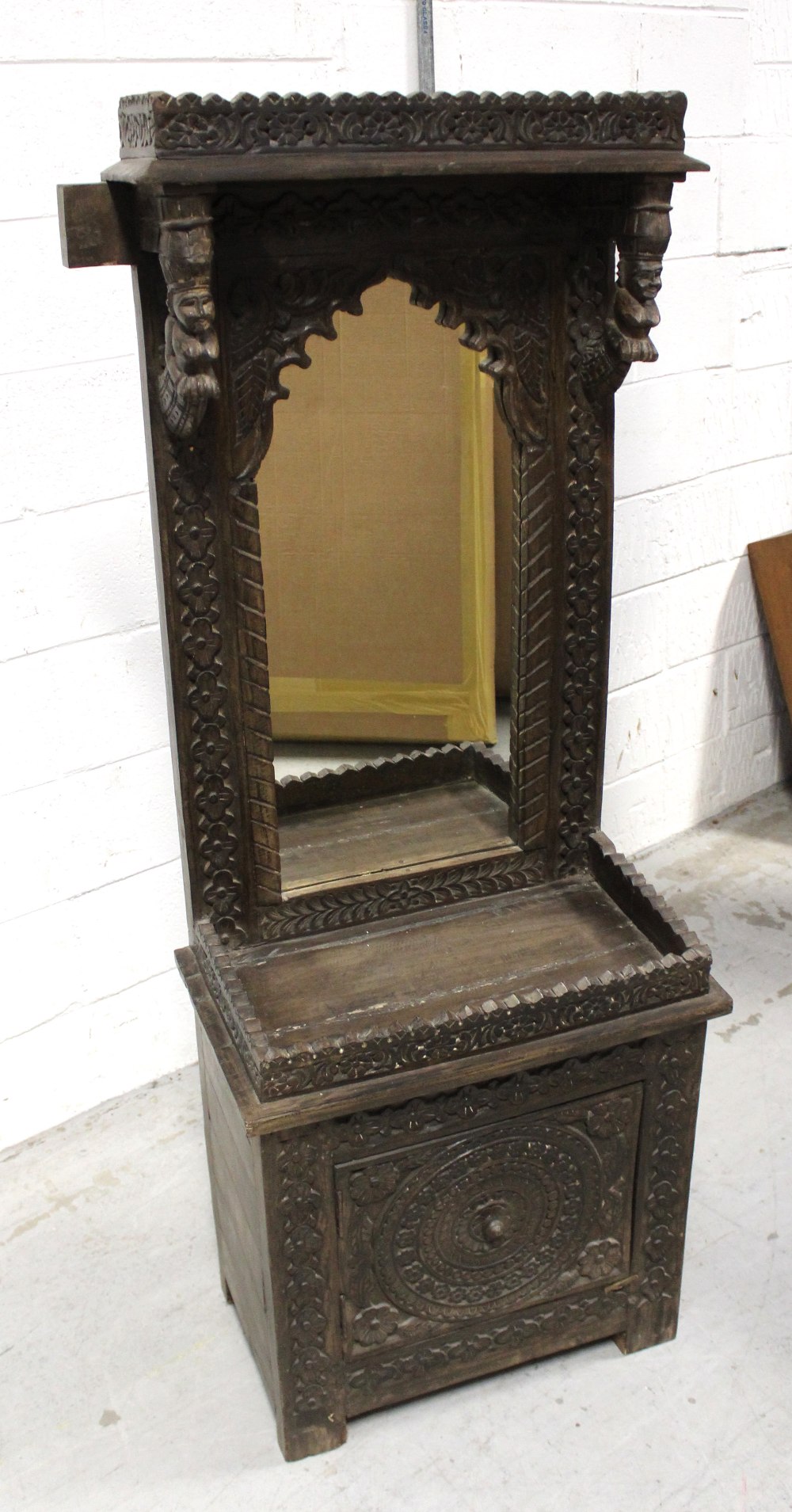 A 19th century Indian hardwood carved mirror stand,