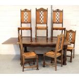A French oak extending dining table with quartered veneers, draw-leaf,