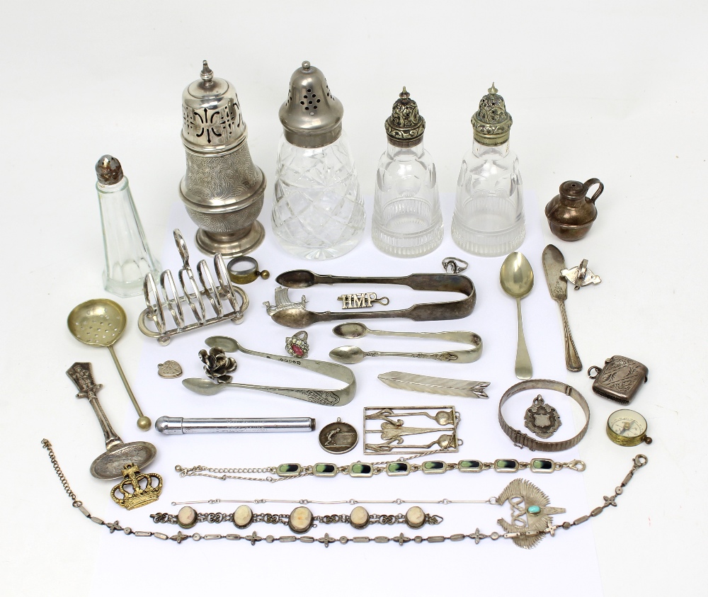 A quantity of hallmarked silver and white metal items to include a vesta case, butter knife,