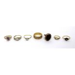 A 9ct gold ladies' wedding band, size R and six ladies' dress rings,