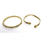Two 9ct gold bangles, approx combined 13.9g (2).