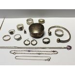A quantity of silver and white metal jewellery to include rings and bracelets and sterling silver