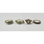 Four ladies' 9ct gold dress rings; a floral-set ring with central opal and red and white stones,