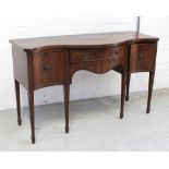 An early 20th century mahogany serpentine-front sideboard,