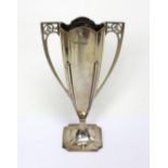 A George V hallmarked silver Art Deco twin-handled vase on a loaded square base, Sheffield 1913,