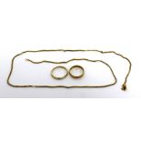 An 18ct gold link chain necklace, an 18ct gold ladies' wedding band, size O and a yellow metal ring,