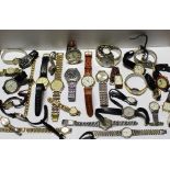 A quantity of ladies' and gentlemen's wristwatches to include Tommy Hilfiger, Sekonda, Seiko,
