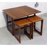 A nest of three McIntosh retro teak tables on rounded edge sleigh supports,