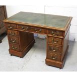 An Edwardian mahogany ladies' kneehole desk,