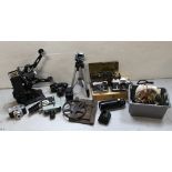 A Quartz-5 8mm cinecamera, a Pathescope reel player, a Pentax ME Super,