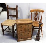 A 20th century Indian hardwood chest of small proportions with four small drawers over two larger