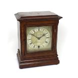 Morath Bros, Liverpool; an oak-cased mantel clock,