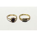 An 18ct gold ladies' dress ring set with three small diamonds on a twist,