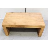 A chunky pine coffee table, 95 x 60.5cm.