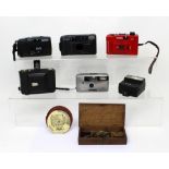 A quantity of cameras to include a Zeiss Ikon, Chinon, Canon, Panoramic and a Halina (5).