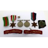 Four WWII medals to include the Defence Medal, the War Medal, the Italy Star and the 1939-1945 Star,