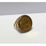 A George V full sovereign, 1927 in a gold ring mount, size Q, approx 13.6g.