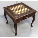 An Eastern carved hardwood chess-top games table, 60 x 60cm.