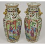 A pair of late 19th century Famille Rose baluster vases,