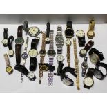 A quantity of ladies' and gentlemen's wristwatches to include Seiko, Swatch, Sekonda, Avia,