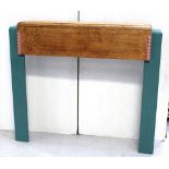 An Art Deco style oak and painted fire surround, width 124cm.