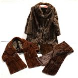 Two mid-20th century vintage musquash fur coats and an evening wrap (3).