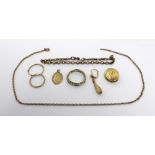 A quantity of 9ct gold jewellery to include a chain link bracelet, an oval locket,
