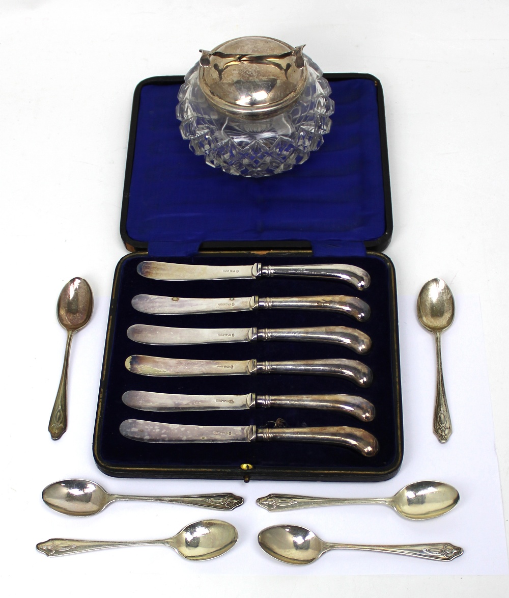 An Edward VII cased set of six hallmarked silver crystal-handled dessert knives, Sheffield 1936,