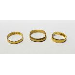 Three 22ct gold wedding bands, sizes R, P and J, approx combined 8.1g (3).