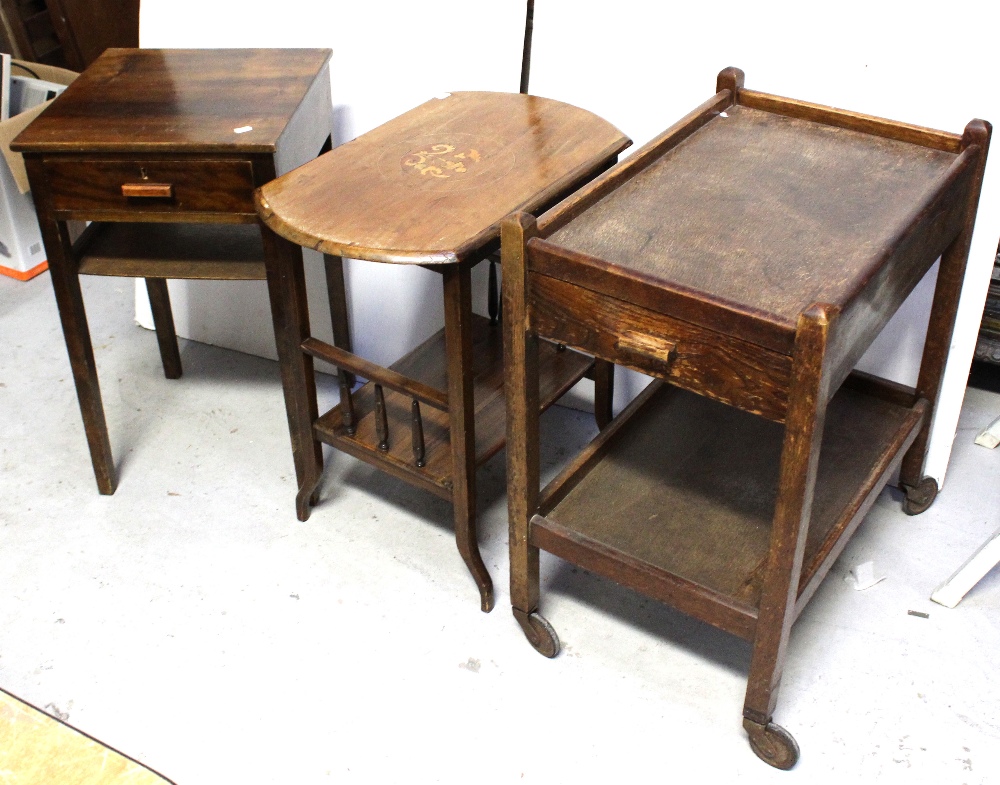 A mahogany bedside cabinet with one central drawer over lower shelf, a c1940 oak tea trolley,