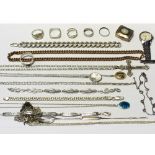 A quantity of silver and white metal jewellery to include lockets, necklaces, a bangle,