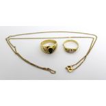 An 18ct gold fine link chain necklace and two ladies' dress rings;