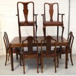 A mid-20th century mahogany dining table, length 152cm,