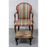 An Edwardian walnut spoon-back chair on cabriole supports and pad feet and a similar footstool on