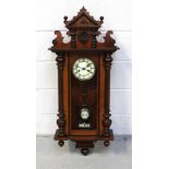 A late Victorian mahogany eight-day Vienna-style wall clock,