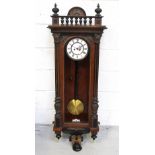 A Victorian mahogany-cased eight-day Vienna-style wall clock,