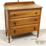 A mid-20th century oak three-drawer chest of drawers on turned supports, 90 x 90cm.