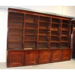 A Victorian mahogany open bookcase of large proportions, the moulded cornice above five sections,