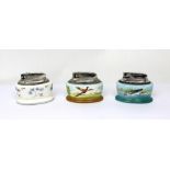 Three Minton hand-painted ceramic table lighters; one painted with leaping salmon, signed A.