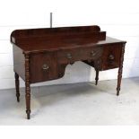 A 19th century mahogany sideboard with single frieze drawer flanked by a cupboard and deep drawer