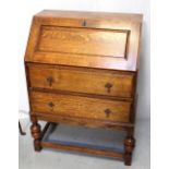 A mid-20th century oak bureau,