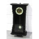 A 20th century ebonised Vienna-style eight-day wall clock, height 62cm.