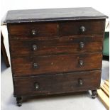 A Victorian stained two-over-three chest of drawers on turned baluster supports, 99 x 99cm.